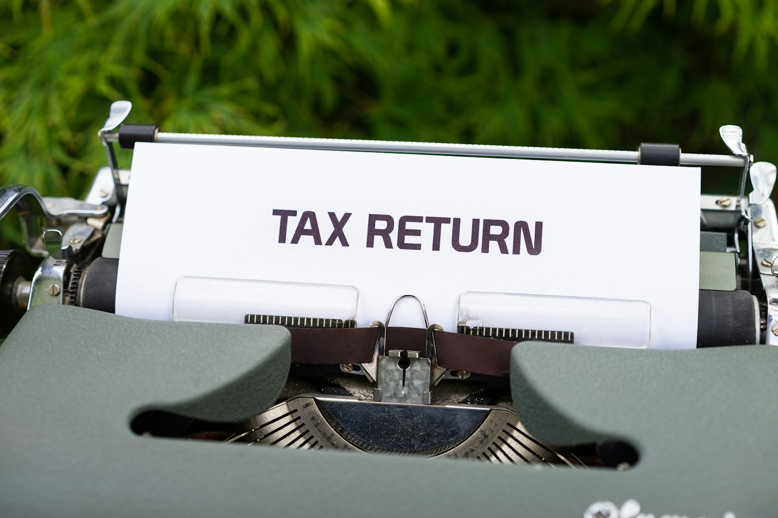 Tax return documents representing state by state home office deduction conformity